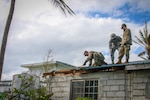 Army Engineers Arrive to Lead Continued Joint-Service Efforts to Install Temporary Roofs after Yutu