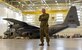 Petty Officer 1st Class William Martin, Fleet Logistics Support Squadron 64 (VR-64) aviation structural mechanic, poses in front of a C-130 Hercules in a hangar on Joint Base McGuire-Dix-Lakehurst, New Jersey, Dec. 12, 2018. Martin has been assigned to VR-64 for less than a year and has received every rank he has made on the first try. (U.S. Air Force photo by Airman 1st Class Ariel Owings)