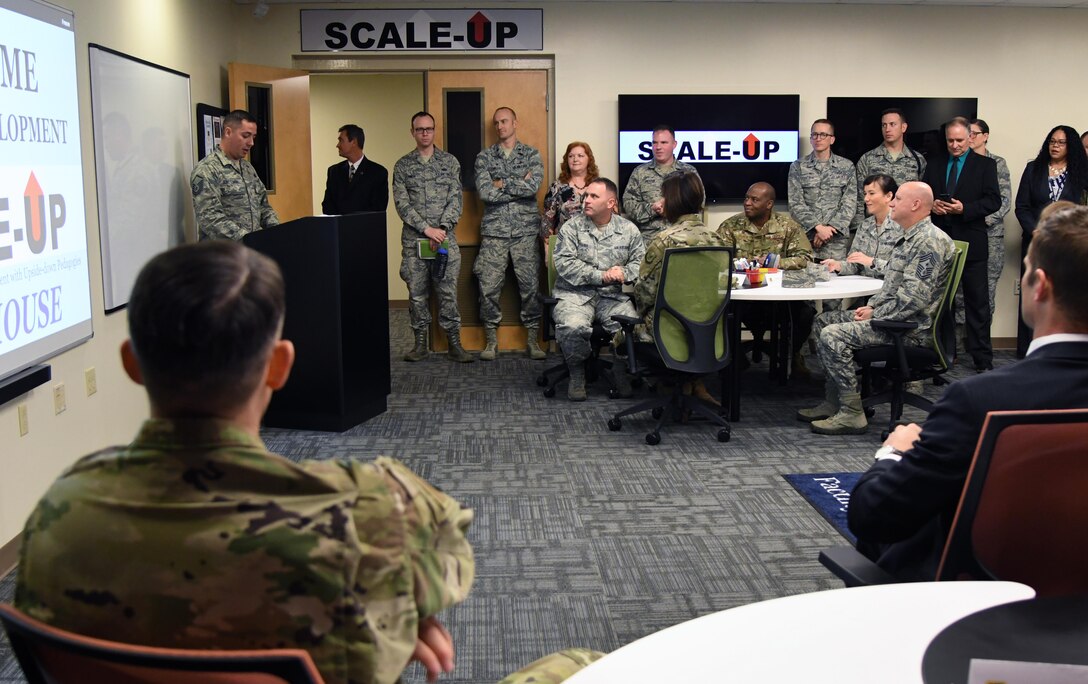 Keesler leadership and 81st Training Wing personnel attend the Student-Centered Active Learning Environment with Upside-down Pedagogies ribbon cutting ceremony inside Allee Hall at Keesler Air Force Base, Mississippi, Jan. 10, 2019. The SCALE-UP program was introduced by the 81st Training Support Squadron as a way to bring new technology and teaching techniques into Keesler classrooms to put more focus on students and their success in Air Force education. (U.S. Air Force photo by Kemberly Groue)