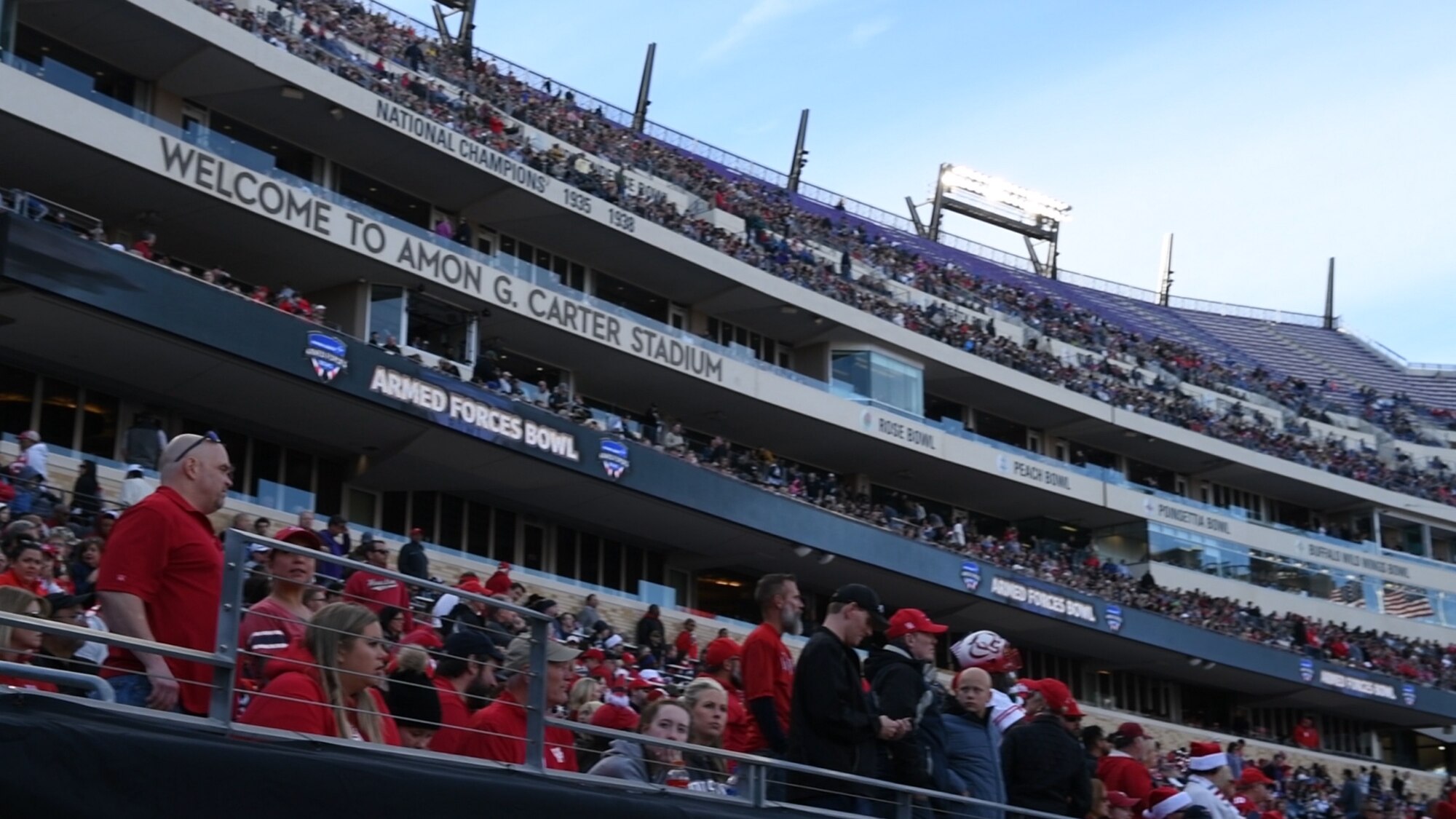 Football fans watch the Armed Forces Bowl, Dec. 22, 2018, at Fort Worth, Texas. The Armed Forces Bowl attracts approximately 700,000 attendees each year for the event that honors the U.S. military. (U.S. Air Force photo by Amn Dallin Wrye)