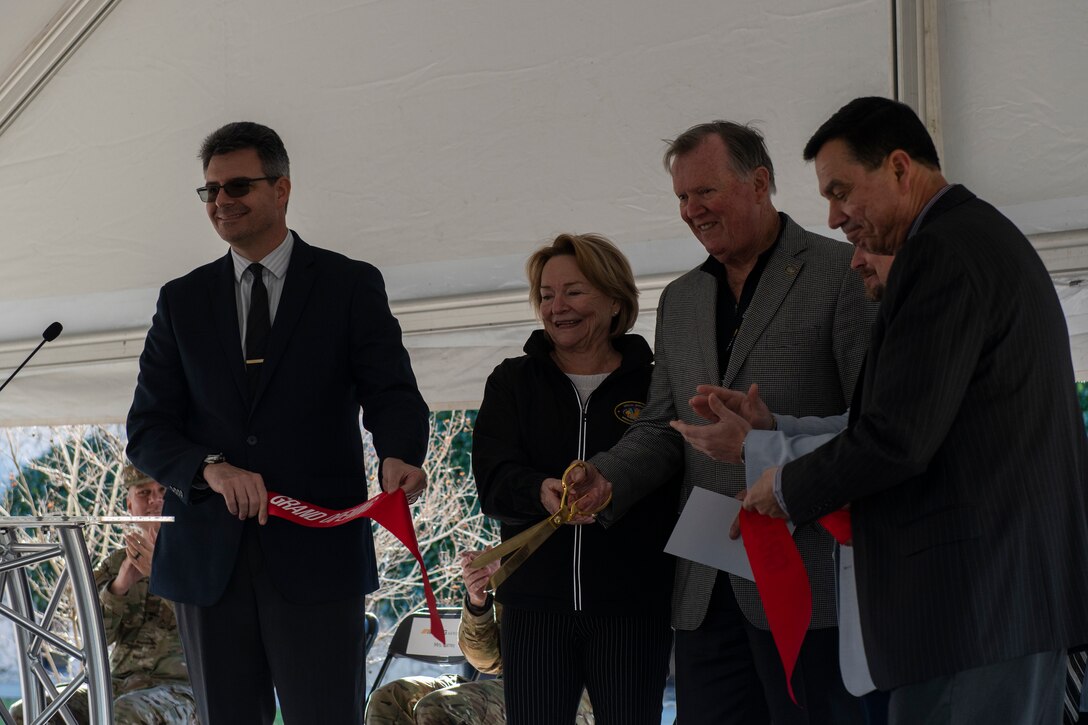 Retired U.S. Air Force Col. John Carney cuts the ribbon to the Special Warfare Technical Integration Support Center during a ribbon cutting and dedication ceremony in Fort Walton Beach, Florida, Jan. 11, 2018.