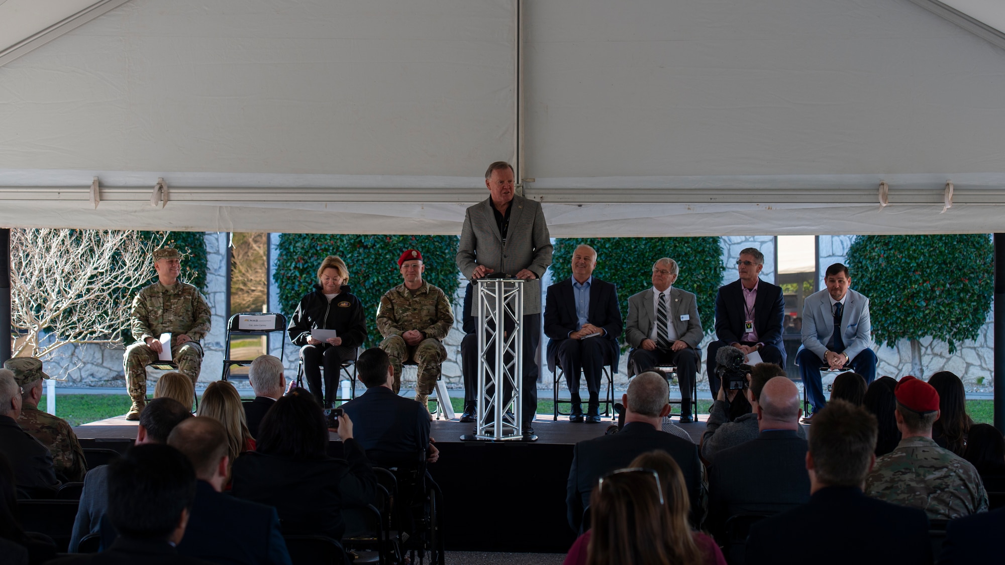 Retired U.S. Air Force Col. John Carney gives remarks during a ribbon cutting and dedication ceremony in Fort Walton Beach, Florida, Jan. 11, 2018.