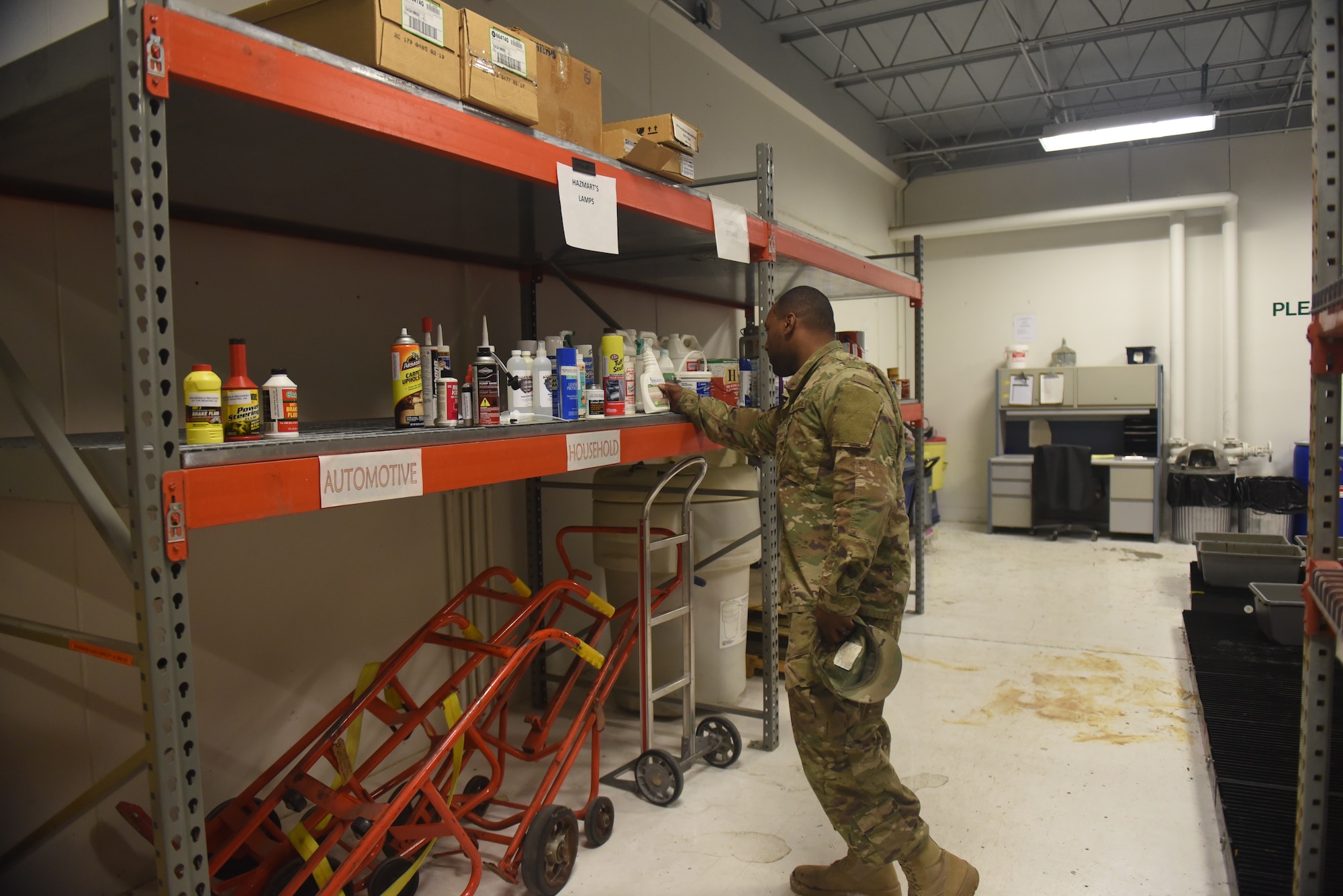 An Airman searches for household cleaning supplies at the Hazmart on Ellsworth Air Force Base, S.D. Professionals from the 28th Logistics Readiness Squadron provide a safe and environmentally-friendly way for Airmen to dispose of their unwanted household chemicals, as well as receive other items for free. Since its opening in January 2018, the Hazmart has issued around 150 individual items and received more than 230 others. (U.S. Air Force photo by Senior Airman Michella Stowers)