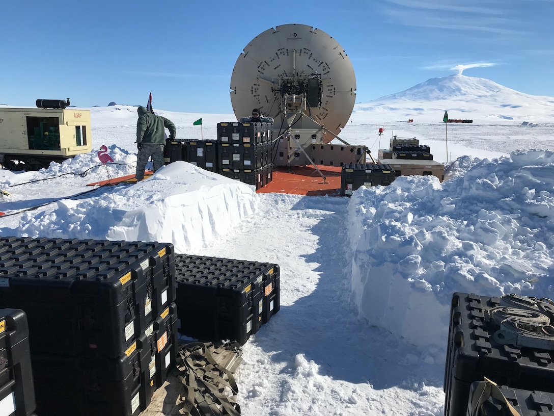A deployable satellite belonging to the 263rd Combat Communications Squadron with the North Carolina Air National Guard is set up on an ice field for use during Operation Deep Freeze (ODF), at McMurdo Station, Antarctica, Dec. 1, 2018. ODF is a military mission in support of the National Science Foundation throughout the continent of Antarctica, to provide air, land, and sea support to McMurdo Station. (Courtesy photo by U.S. Air Force Master Sgt. Chris Farnsworth)