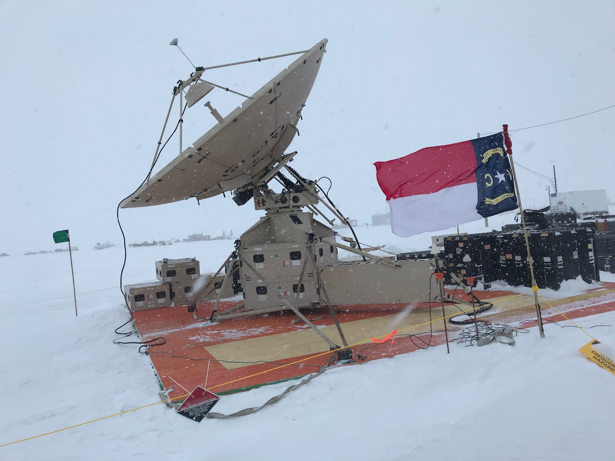 A deployable satellite belonging to the 263rd Combat Communications Squadron with the North Carolina Air National Guard is set up on an ice field for use during Operation Deep Freeze (ODF), at McMurdo Station, Antarctica, Dec. 1, 2018. ODF is a military mission in support of the National Science Foundation throughout the continent of Antarctica, to provide air, land, and sea support to McMurdo Station. (Courtesy photo by U.S. Air Force Master Sgt. Chris Farnsworth)