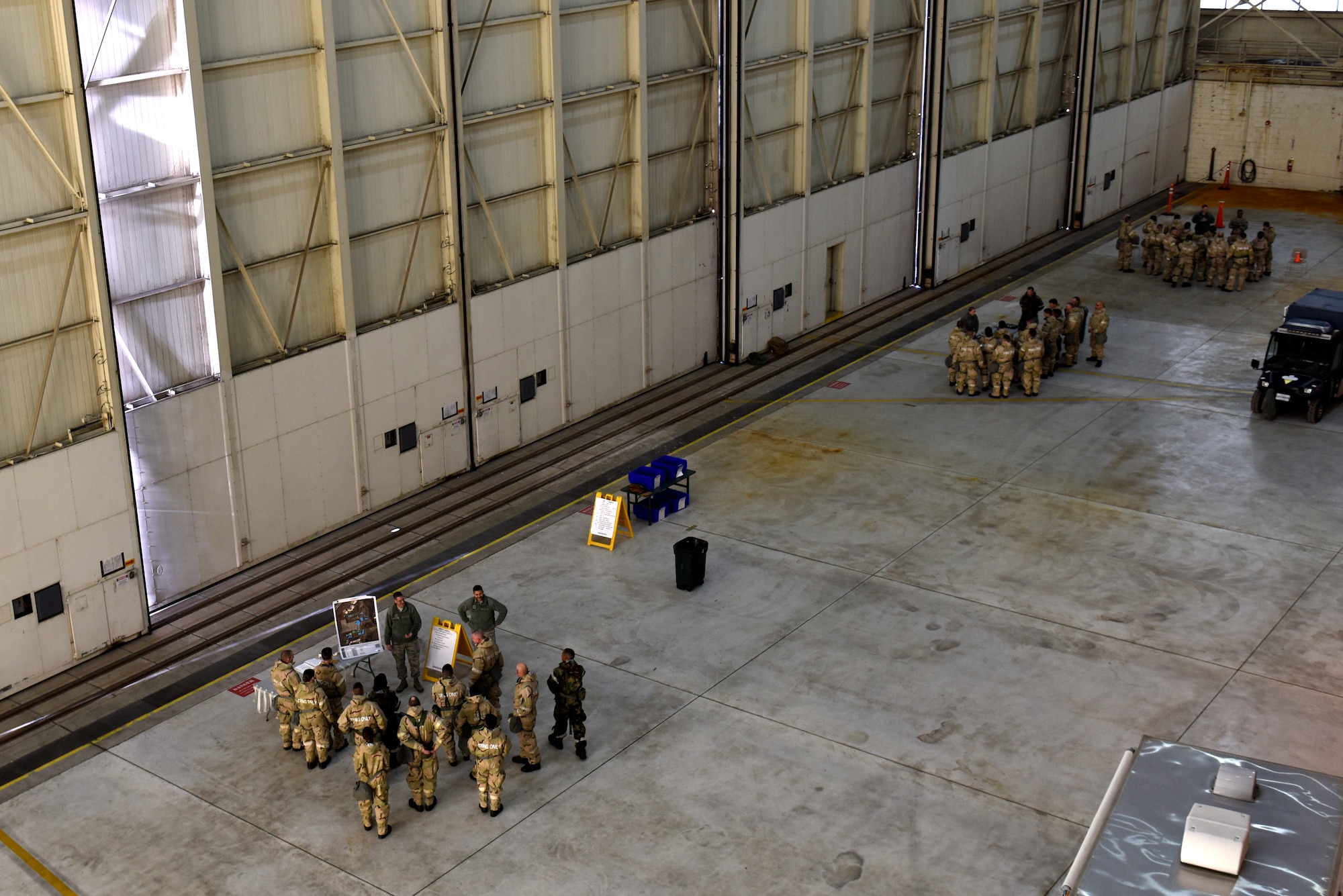 Members of the North Carolina Air National Guard participate in an Ability To Survive and Operate (ATSO) training held in a C-17 Globemaster III hangar at the North Carolina Air National Guard (NCANG) Base, Charlotte Douglas International Airport, Jan. 10, 2019. The ATSO exercise consists of ten rotating stations and serves as refresher training for situations like self-aid buddy care, explosive ordinance device recognition, and chemical warfare decontamination stations.