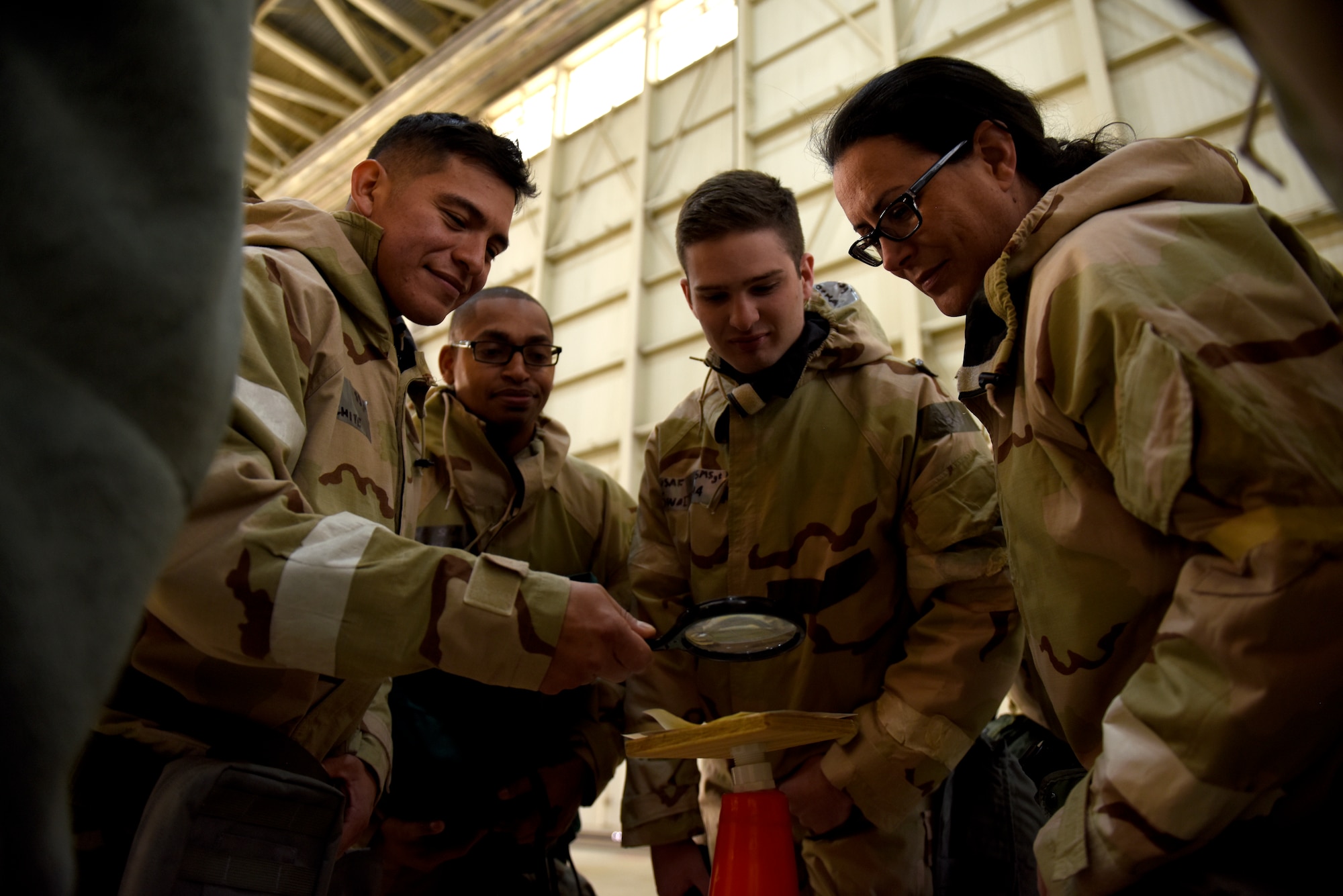 Members of the North Carolina Air National Guard participate in an Ability To Survive and Operate (ATSO) training held in a C-17 Globemaster III hangar at the North Carolina Air National Guard (NCANG) Base, Charlotte Douglas International Airport, Jan. 10, 2019. The ATSO exercise consists of ten rotating stations and serves as refresher training for situations like self-aid buddy care, explosive ordinance device recognition, and chemical warfare decontamination stations.