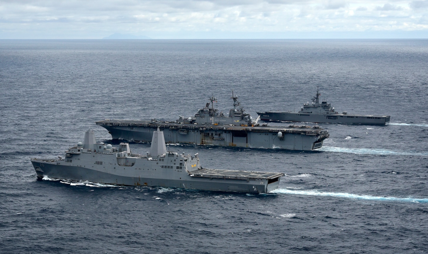COAST OF KYUSHU –  U.S. Navy Ships assigned to the Wasp Amphibious Ready Group (ARG) joined Japan Maritime Self-Defense Force (JMSDF) amphibious transport dock ship, JS Kunisaki (LST 4003), for a cooperative deployment (CODEP), Jan. 11-12.