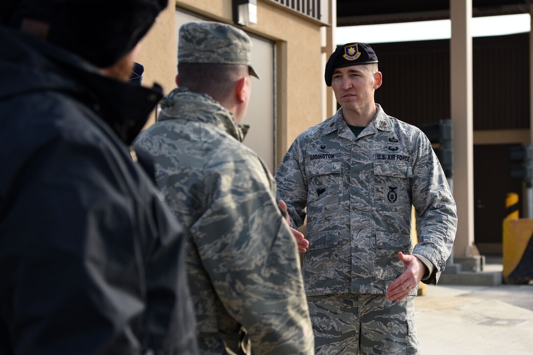 U.S. Air Force Maj. Stephen Addington, 51st Security Forces Squadron commander, gives Team Osan members a tour of the newly improved Morin Gate during its opening ceremony at Osan Air Base, Republic of Korea, Jan. 4, 2019. The project, funded by the ROK, cost $17.8 million and upgraded its capacity to monitor the access of privately owned vehicles, search commercial vehicles, and process visitor and long-term pass requests. (U.S. Air Force photo by Senior Airman Kelsey Tucker)
