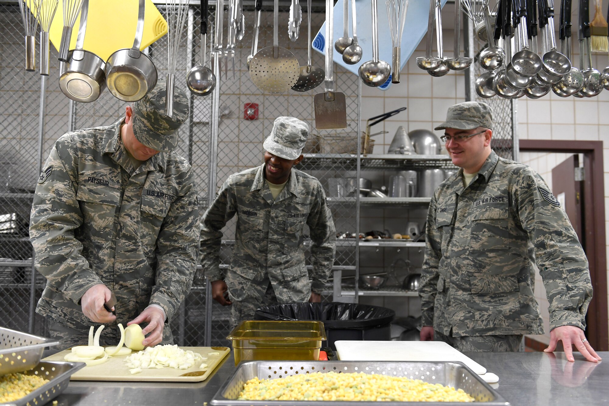 Members from both the North Carolina Air National Guard and Niagara Falls Air Reserve Station, New York, prepare lunch in the dining facility during drill weekend at the North Carolina Air National Guard Base, Charlotte Douglas International Airport, Jan. 12, 2019. Food services Airmen from the North Carolina Air National Guard train members from the Niagara Falls Air Reserve Station, New York, on full-service kitchen operations in preparation for the upcoming Air Force active duty and reserve Hennessy Award competition.