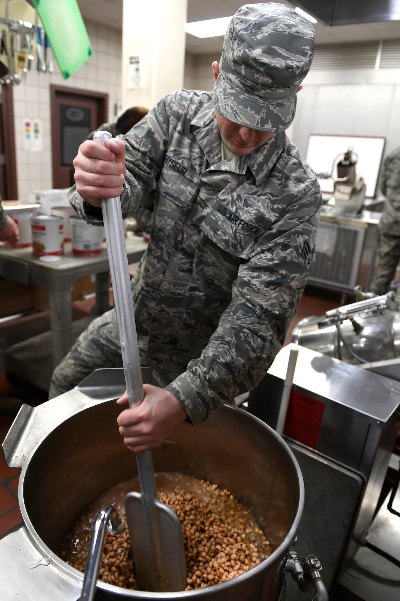U.S. Air Force Senior Airman Paul Payseur, 145th Force Support Squadron, prepares black eye peas for lunch in the dining facility during drill weekend at the North Carolina Air National Guard Base, Charlotte Douglas International Airport, Jan. 12, 2019. Food services Airmen from the North Carolina Air National Guard train members from the Niagara Falls Air Reserve Station, New York, on full-service kitchen operations in preparation for the upcoming Air Force active duty and reserve Hennessy Award competition.