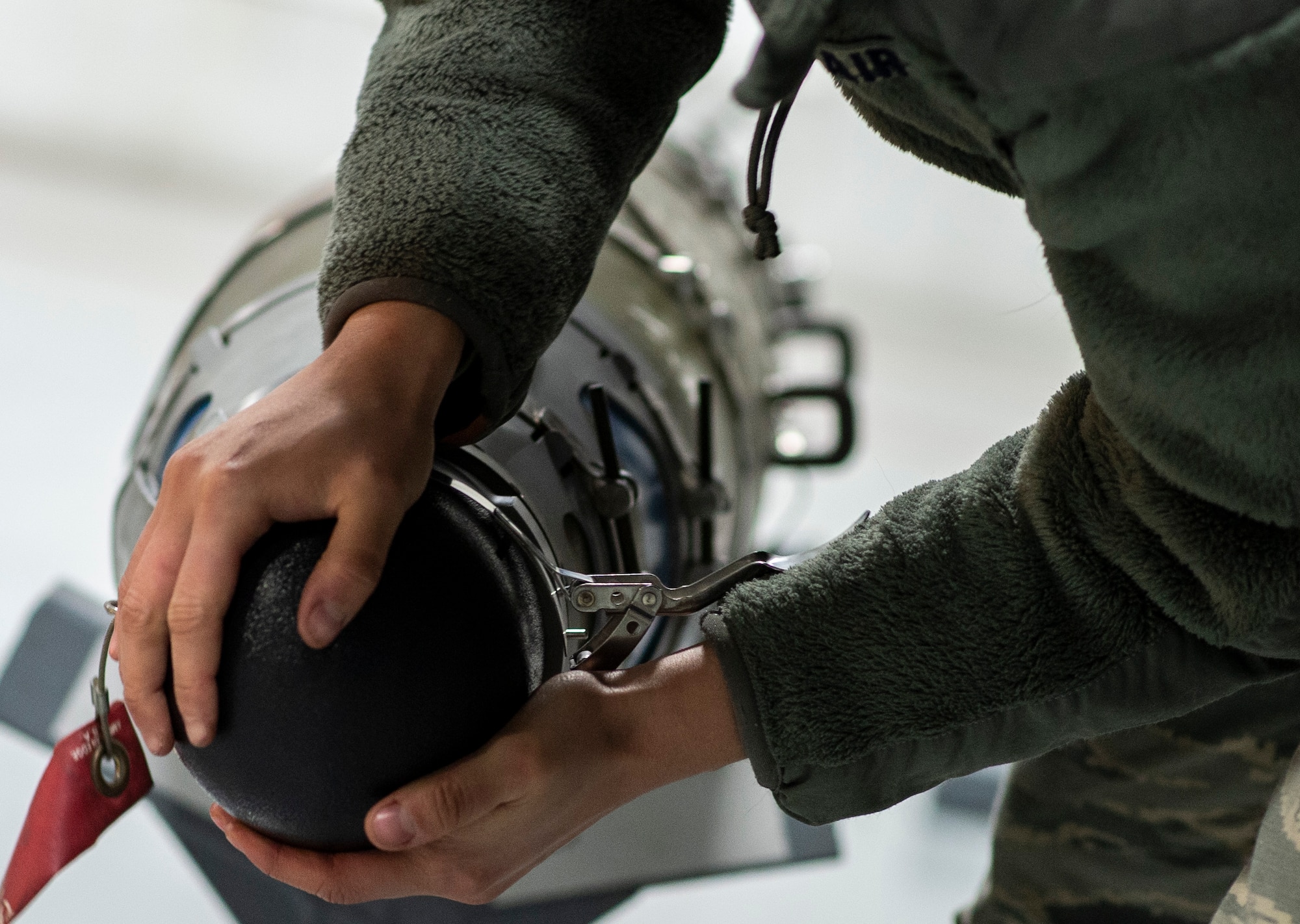 U.S. Air Force Airman 1st Class Naomi Sosa, 20th Aircraft Maintenance Squadron, 79th Aircraft Maintenance Unit weapons load team member, prepares to remove a nose cap from a GBU-38 at Shaw Air Force Base, S.C., Jan. 10, 2019.