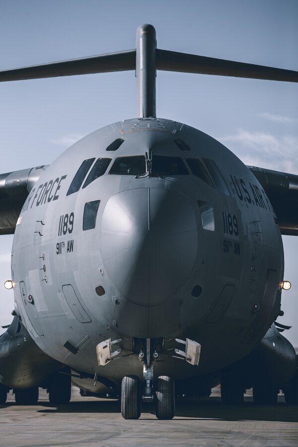 A C-17 Globemaster III with 729th Airlift Squadron, Air Force Reserve Command, powers down it's engines at the Air Combat Element landing strip as a part of a rapid deployment ready exercise at the Marine Corps Air Ground Combat Center, Twentynine Palms, Calif., Nov. 28, 2018. The purpose of this exercise was to display 2nd Battalion, 7th Marine Regiment, 1st Marine Division capabilities to deploy its command assets anywhere around the world in 96 hours within a 24 hour notice. (U.S. Marine Corps photo by Lance Cpl. William Chockey)