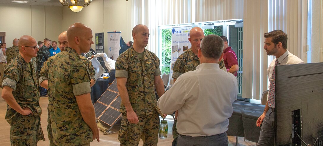 Marines learn about products offered by Vricon during Tactical & Tech Day at the Desert View Club, aboard the Marine Corps Air Ground Combat Center, Twentynine Palms, Calif., Oct. 2, 2018. The Tactical & Tech Day gives Department of Defense contractors the opportunity to show the Combat Center’s unit leaders the newest technology available. (U.S. Marine Corps photo by Lance Cpl. Christopher Andrew Tate)