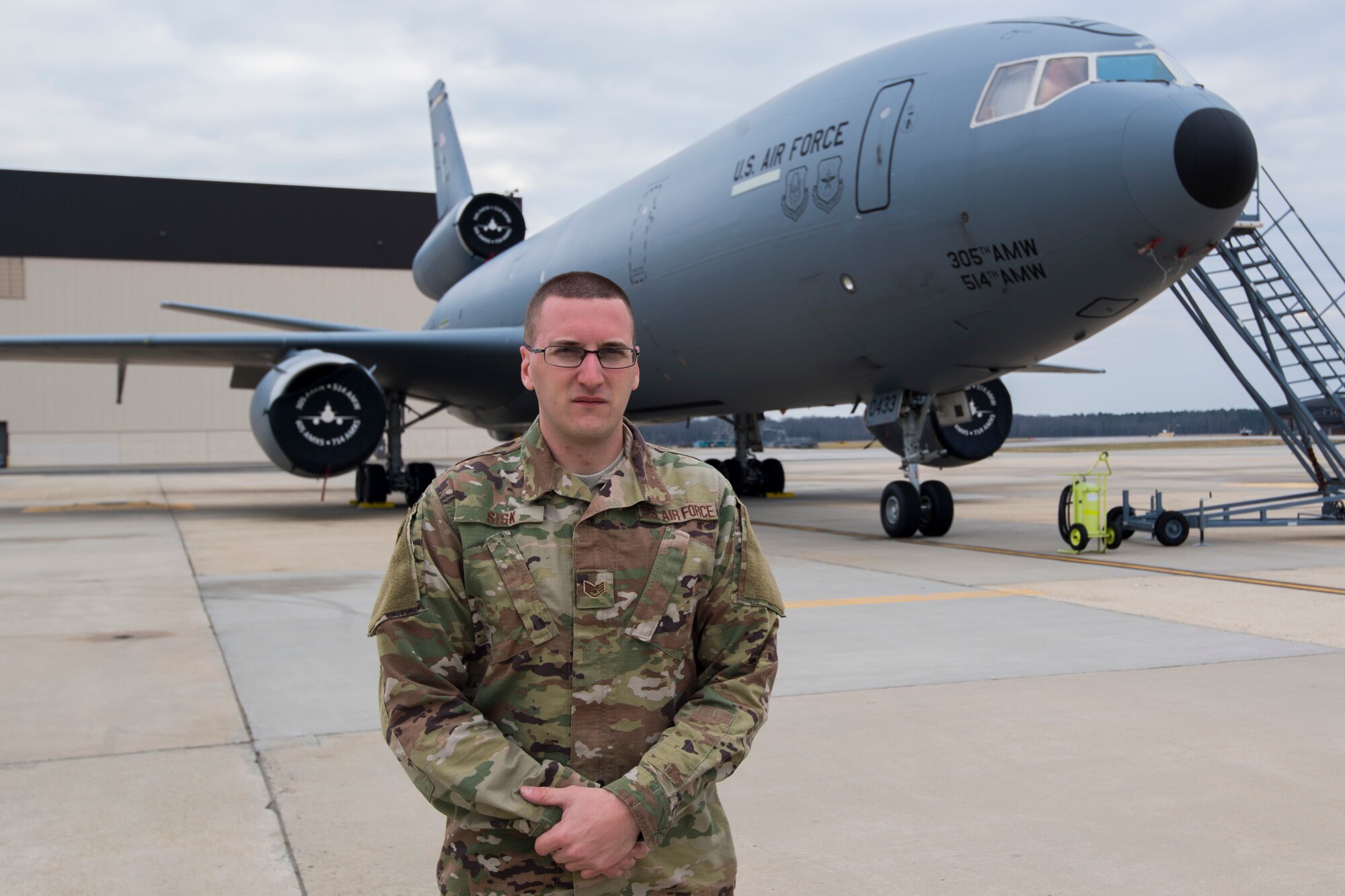 U.S. Air Force Staff Sgt. Beau J. Sisk, a KC-10 Extender crew chief with the 714th Aircraft Maintenance Squadron, 514th Maintenance Group, 514th Air Mobility Wing, poses for a photo on Joint Base McGuire-Dix-Lakehurst, N.J., January 6, 2018.