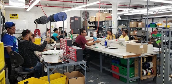 Roanwell employees prepare avionics cabling at the company’s factory in the Bronx, New York.