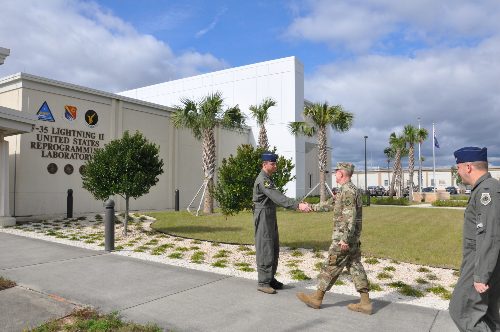 Photo of Lt. Col. Andrew Congdon, 513th Electronic Warfare Squadron commander, greets Air Force Vice Chief of Staff Gen. Stephen W. Wilson