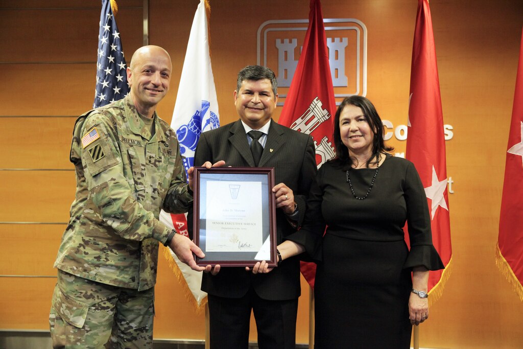 USACE Deputy Commanding General for Civil and Emergency Operations Maj. Gen. Scott Spellmon inducted South Pacific Division Regional Business Director John Moreno into the Senior Executive Service at a ceremony in the Los Angeles District Jan. 10. Moreno’s wife Joann, grandson Edward Lopez, and nephew Jonathan Ochoa participated in the presentation of the induction pin, reciting of the oath of office, and uncasing and unfurling of the flag of the Senior Executive Service. Moreno has more than 26 years of experience with the Corps and now provides executive leadership and direction for the South Pacific Division and its four subordinate Districts in operating as a Regional Business Center.