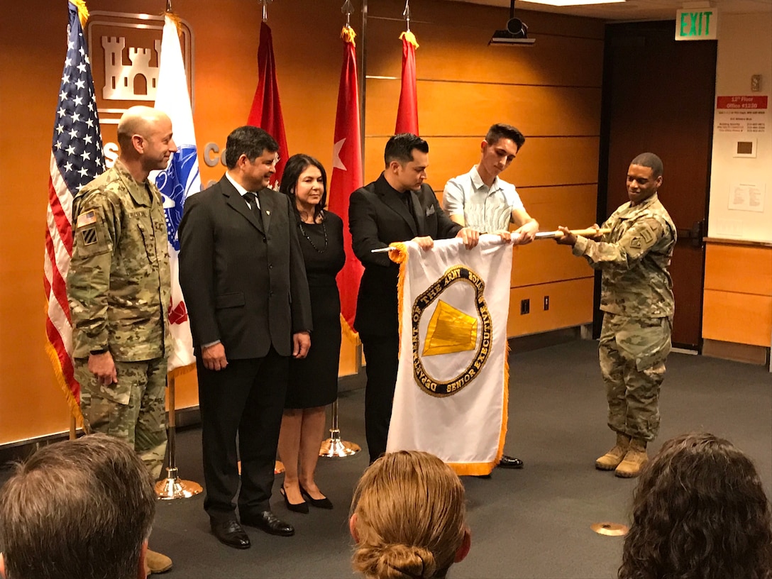 USACE Deputy Commanding General for Civil and Emergency Operations Maj. Gen. Scott Spellmon inducted South Pacific Division Regional Business Director John Moreno into the Senior Executive Service at a ceremony in the Los Angeles District Jan. 10. Moreno’s wife Joann, grandson Edward Lopez, and nephew Jonathan Ochoa participated in the presentation of the induction pin, reciting of the oath of office, and uncasing and unfurling of the flag of the Senior Executive Service. Moreno has more than 26 years of experience with the Corps and now provides executive leadership and direction for the South Pacific Division and its four subordinate Districts in operating as a Regional Business Center.