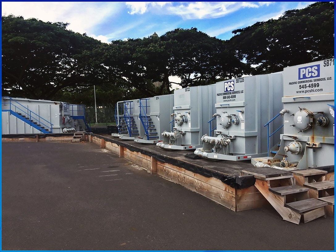 The Navy is using temporary tanks like these to store fuel oil reclaimed.