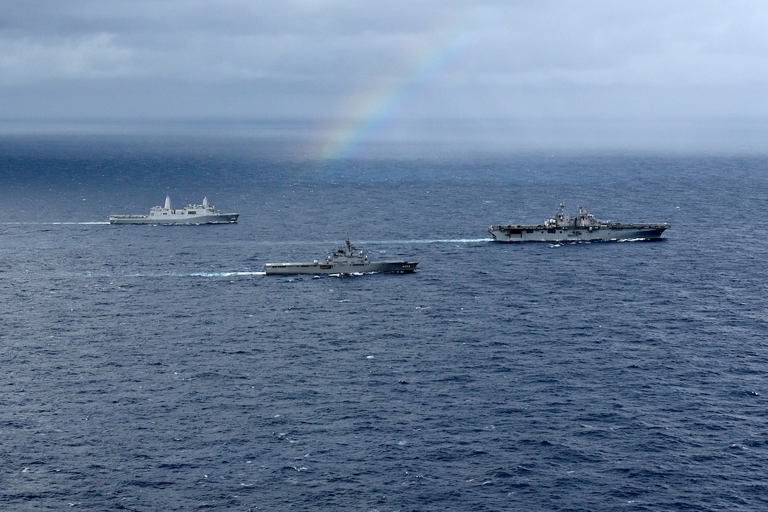 Ships travel out to sea.