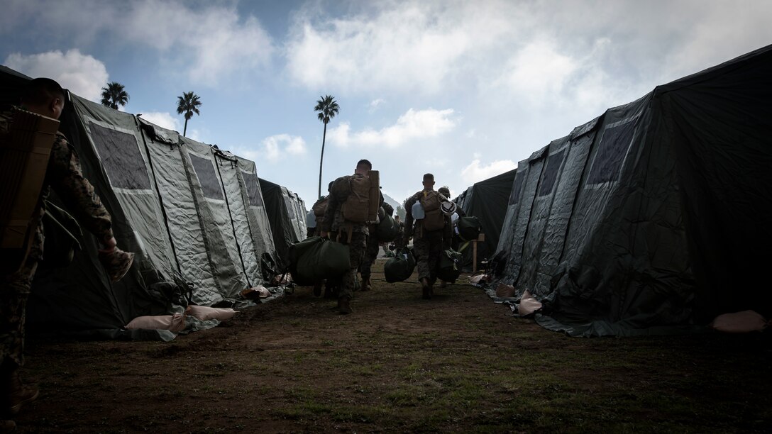 U.S. Marines with Marine Wing Support Squadron (MWSS) 373, Marine Wing Support Group (MWSG) 37, 3rd Marine Aircraft Wing (MAW), begin staging gear near the runway at Airport in the Sky on Catalina Island, Calif., Jan. 9. The partnership between the Marine Corps and the Catalina Island Conservancy provides a unique opportunity to conduct applicable training while also helping the community. (U.S. Marine Corps photo by Cpl. Samuel Ruiz)