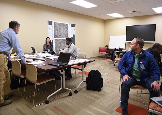 Inspection Control Group members review maps and checklists during a Chemical Weapons Convention Treaty inspection exercise Jan. 19, 2019, at Joint Base Charleston, S.C.