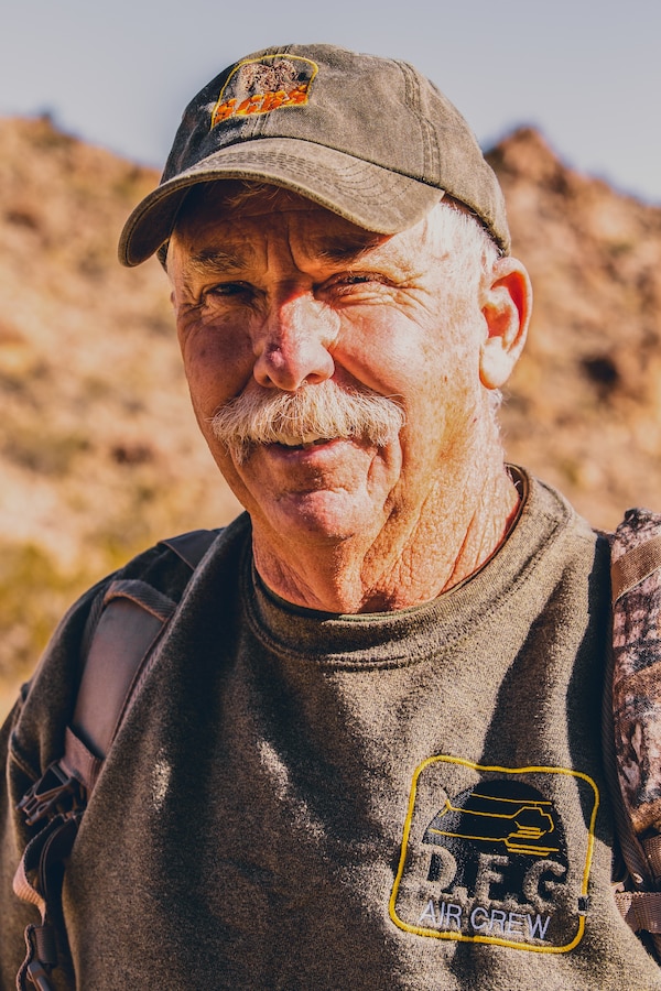 George Kerr, former president of the Society for the Conservation of big horn sheep, volunteers at the construction site of a water guzzler at Marine Corps Air Ground Combat Center, Twentynine Palms, Calif., Jan. 4, 2019. Members of the San Bernadino County community joined together with the California Conservation Corps to build a water guzzler in an effort to provide natural resources needed to sustain the bighorn sheep population in the surrounding area. (U.S. Marine Corps photo by Lance Cpl. Aaron Harshaw)
