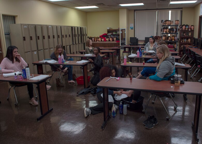 Spouses of members assigned to the 97th Air Mobility Wing receive complimentary pedicures, Jan. 12, 2019, at the Southwest Technology Center, Altus, Okla.