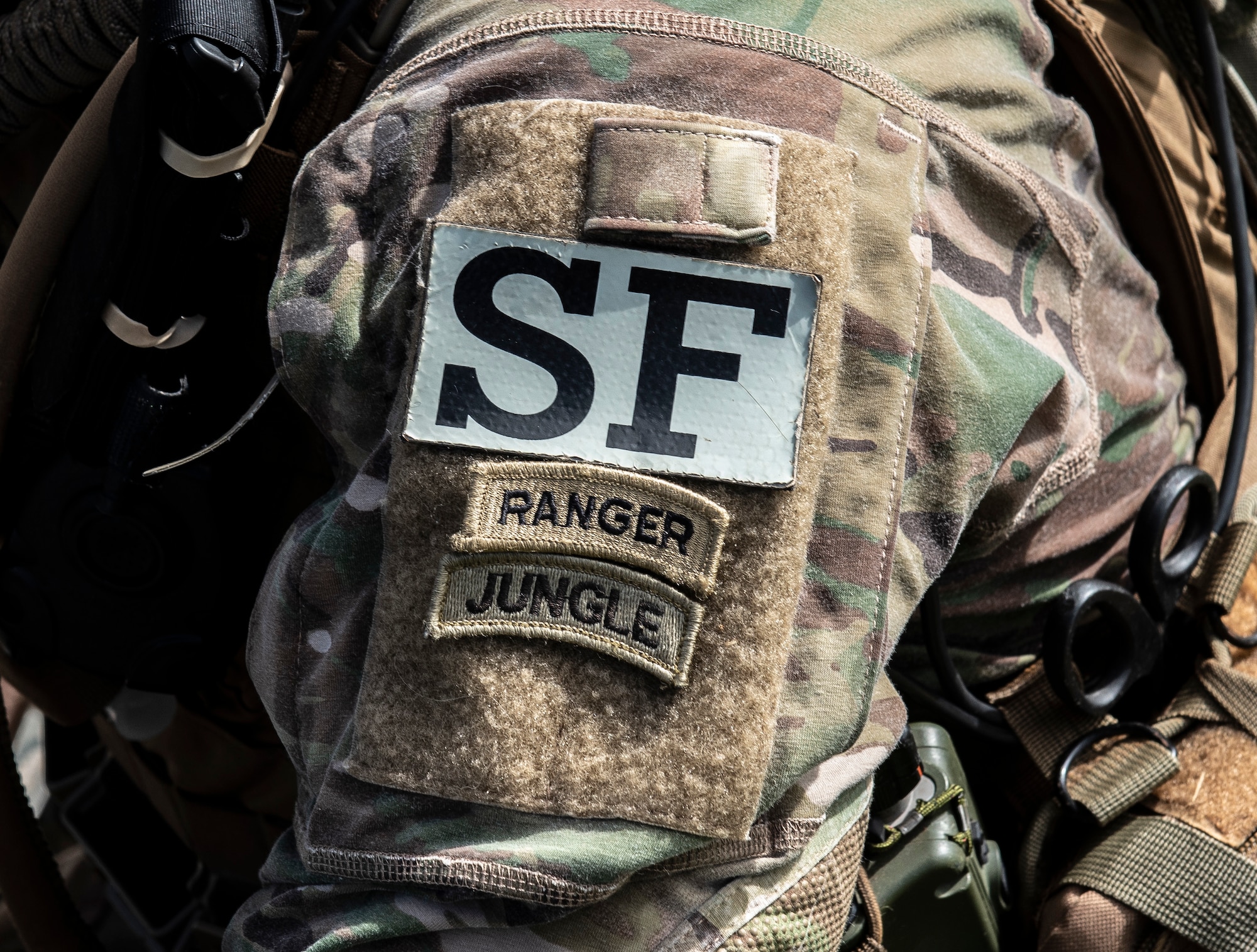 Students await instruction during tier 1 and 2 Commando Warrior training at North West Field near Andersen Air Force Base, Guam Dec. 10, 2018. The 14-day course was hosted by the 736th Security Forces Squadron and encompassed convoy operations, counter improvised explosive devices, navigation, advanced weapons tactics, and other skills to promote base and mobile security. (U.S. Air Force photo by Master Sgt. JT May III)