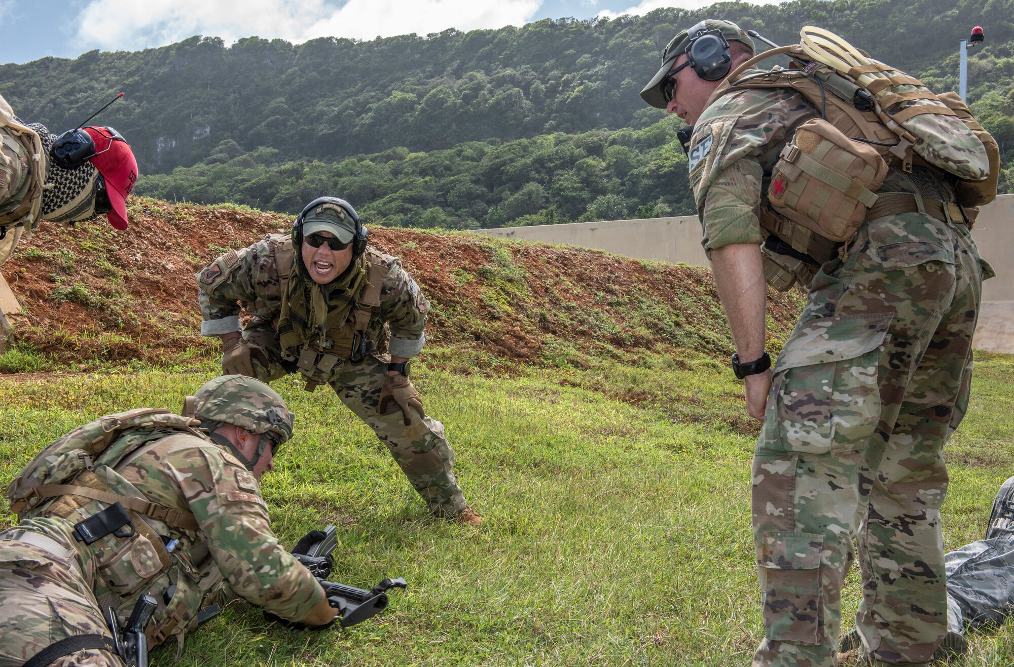Staff Sgt. Jared Palomo, 736h Security Forces Squadron Commando Warrior instructor, motivates a student during tier 1 and 2 training at North West Field near Andersen Air Force Base, Guam Dec. 10, 2018. The 736th SFS trains frontline defenders from all bases assigned to Pacific Air Forces on U.S. Central Command and regional training requirements so they can deploy as well as utilize trained skills at their home stations, (U.S. Air Force photo by Master Sgt. JT May III)
