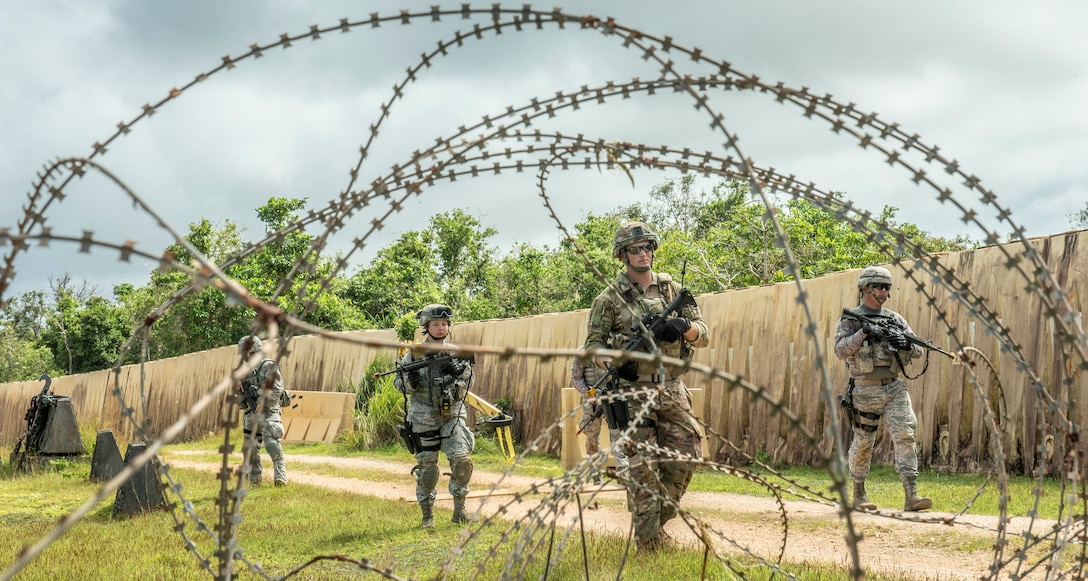 Security Force members conduct foot patrols during tier 1 and 2 Commando Warrior training at North West Field near Andersen Air Force Base, Guam Dec. 11, 2018. The training was hosted by the 736th Security Forces Squadron as part of the CSAF’s Year of the Defender initiative. Sixty-eight active duty and Air National Guard members graduated from the 14-day course Dec. 14, 2018. (U.S. Air Force photo by Master Sgt. JT May III)