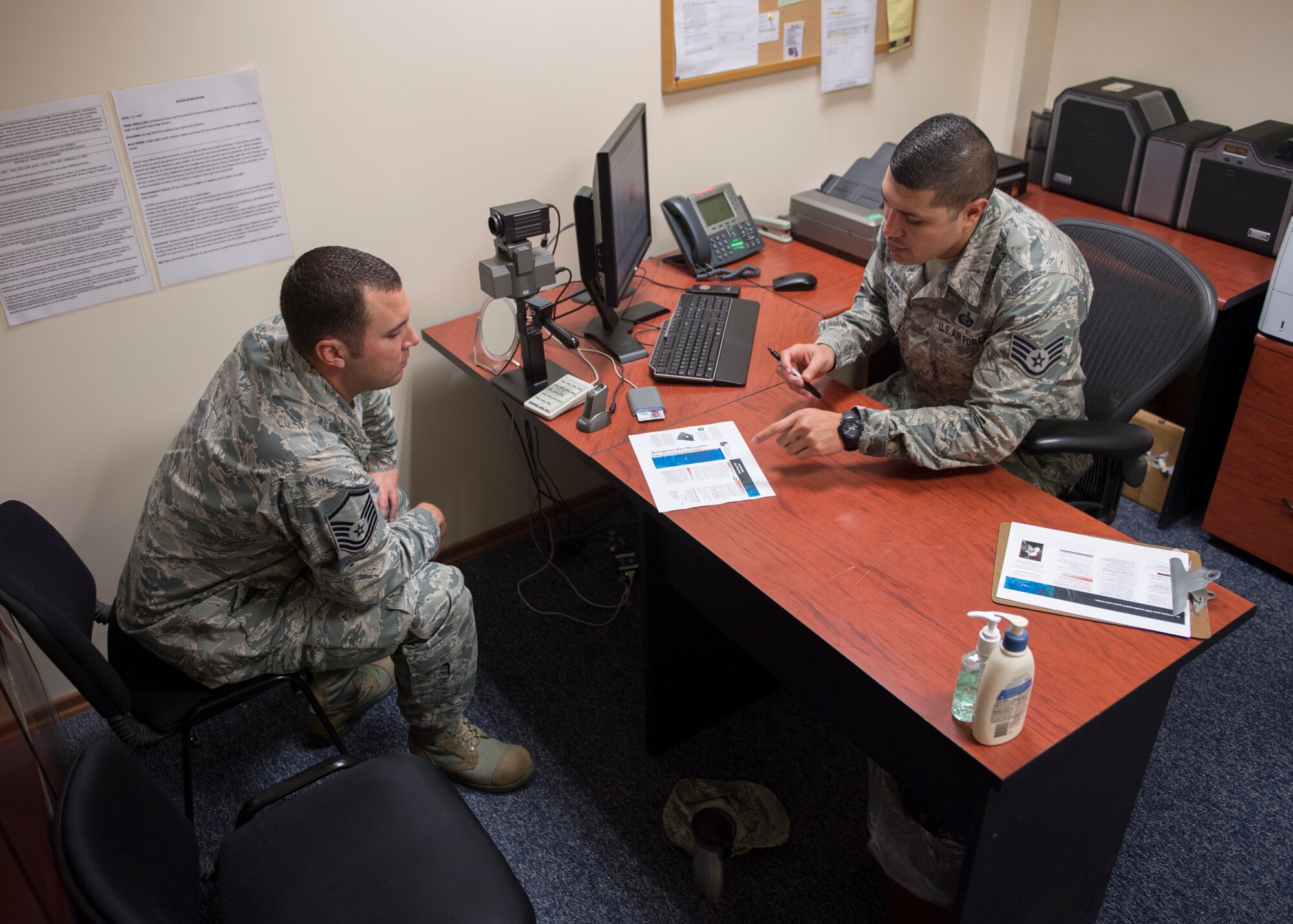 U.S. Air Force Staff Sgt. Maximiliano Estrada, 39th Force Support Squadron Military Personnel Flight NCO in charge of customer service, creates a new ID for a customer at Incirlik Air Base, Turkey, Nov. 27, 2018.