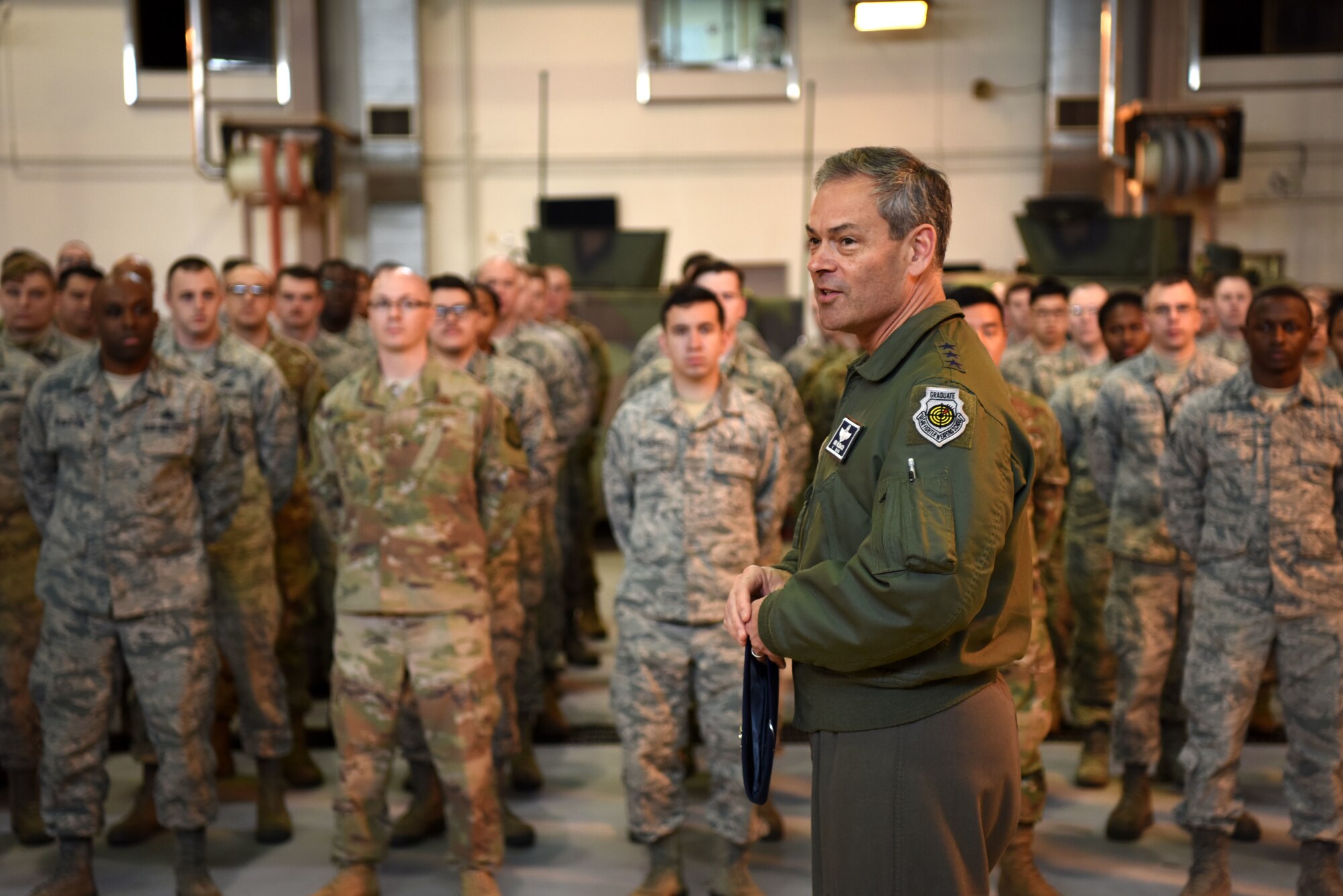 U.S. Air Force Lt. Gen. Kenneth Wilsbach, 7th AF commander, speaks with Airmen assigned to the 51st Logistics Readiness Squadron during an immersion tour at Osan Air Base, Republic of Korea, Jan. 11, 2019. Wilsbach visited multiple facilities on base during the tour, including the 51st LRS vehicle maintenance bay, the 51st Fighter Wing headquarters, and the newly opened Morin Gate. (U.S. Air Force photo by Senior Airman Kelsey Tucker)