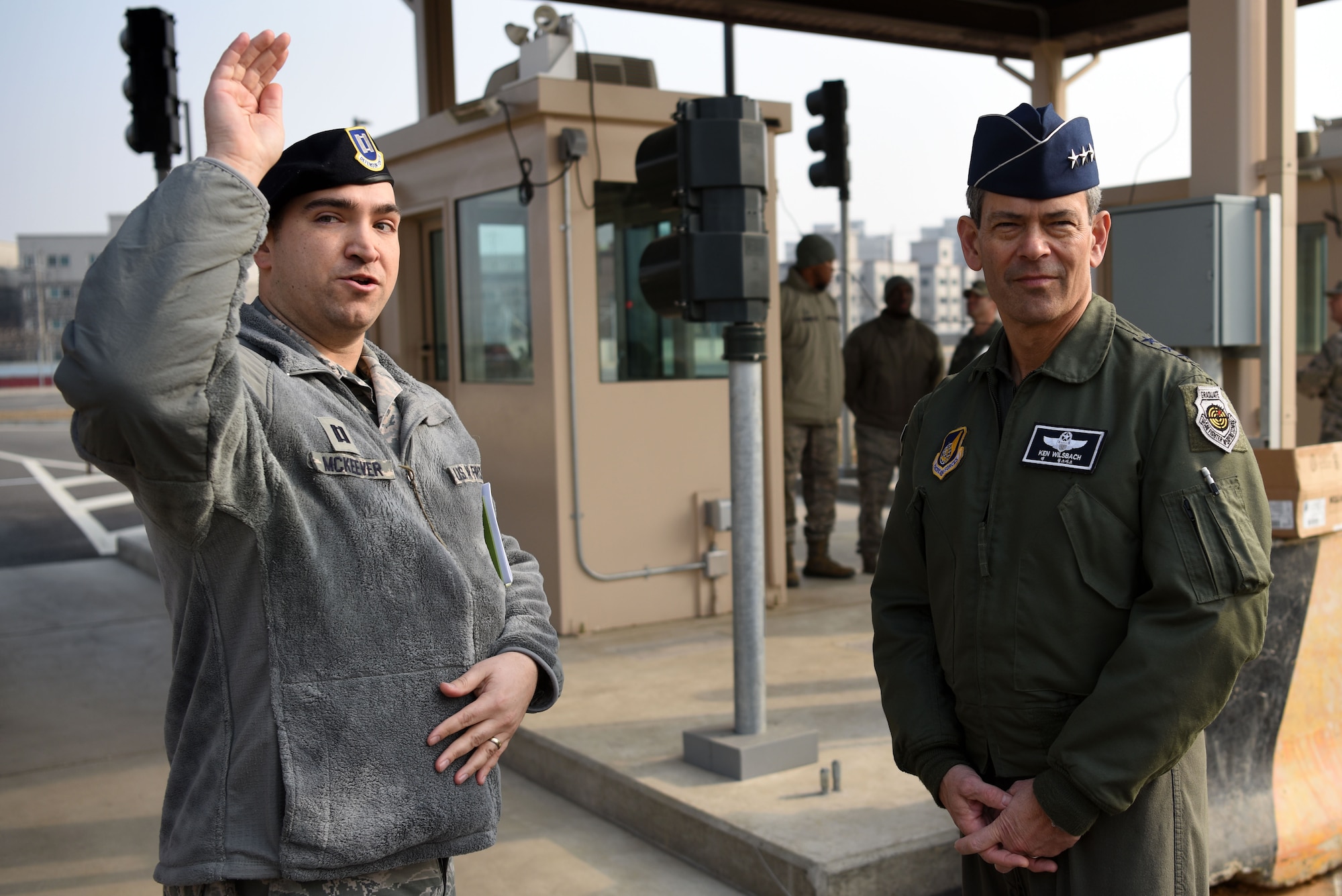 U.S. Air Force Lt. Gen. Kenneth Wilsbach, 7th AF commander, speaks with Capt. Lance McKeever, 51st Security Forces Squadron deputy commander, about the newly opened Morin Gate during an immersion tour at Osan Air Base, Republic of Korea, Jan. 11, 2019. The improved Morin Gate took the place of the Doolittle Gate, with better antiterrorism and force protection measures while increasing throughput capacity and traffic control. (U.S. Air Force photo by Senior Airman Kelsey Tucker)