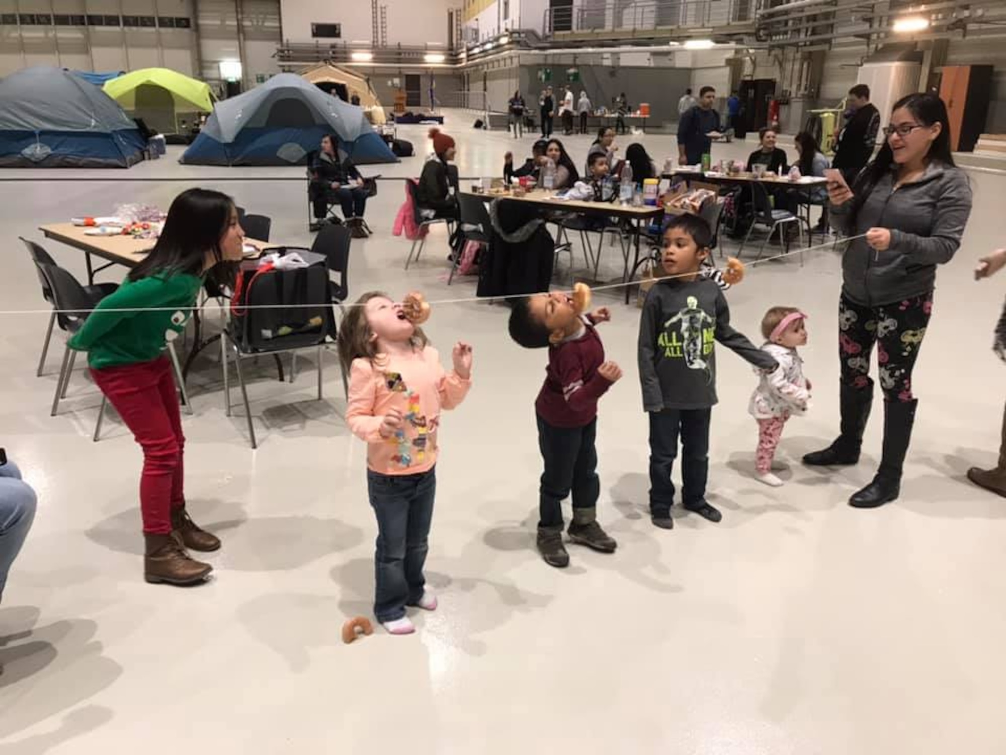 The 721st Aircraft Maintenance Squadron held a lock-in event inside the squadron hangar January 5, 2019. Airmen were encouraged to bring their families to stay overnight in the hangar to participate in food, fun, and a multitude of games such as nerf wars, a bounce house, and Tug-of-War. (Courtesy Photo)