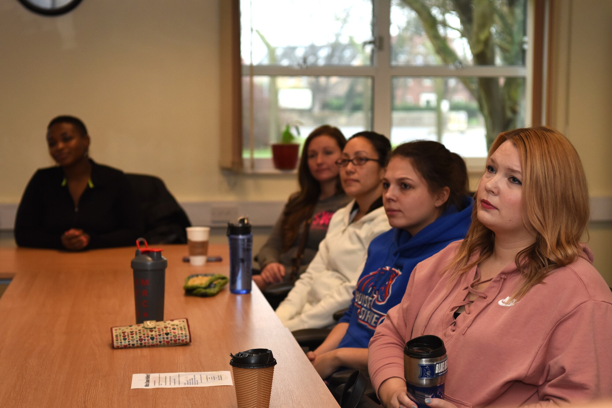 Team Mildenhall spouses listen to Catarina Wyatt, Master Resiliency Trainer, during a discussion on mindfulness and resiliency at RAF Mildenhall, England, Jan. 10, 2019. Wyatt, Stephanie Lindner and Ryann Paul led the training on mindfulness and resiliency and took spouses to a local yoga studio for a Restorative Yoga session. (U.S. Air Force photo by Airman 1st Class Brandon Esau)