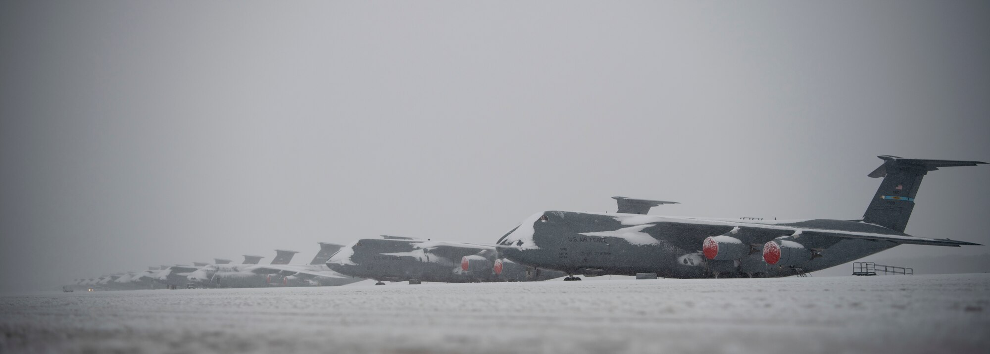 Team Dover Airmen respond to winter Storm Gia on January 13, 2019, at Dover Air Force Base, Del. This was the first snow of the new year with approximately 4 inches reported. (U.S. Air Force photo by Airman 1st Class Zoe M. Wockenfuss)