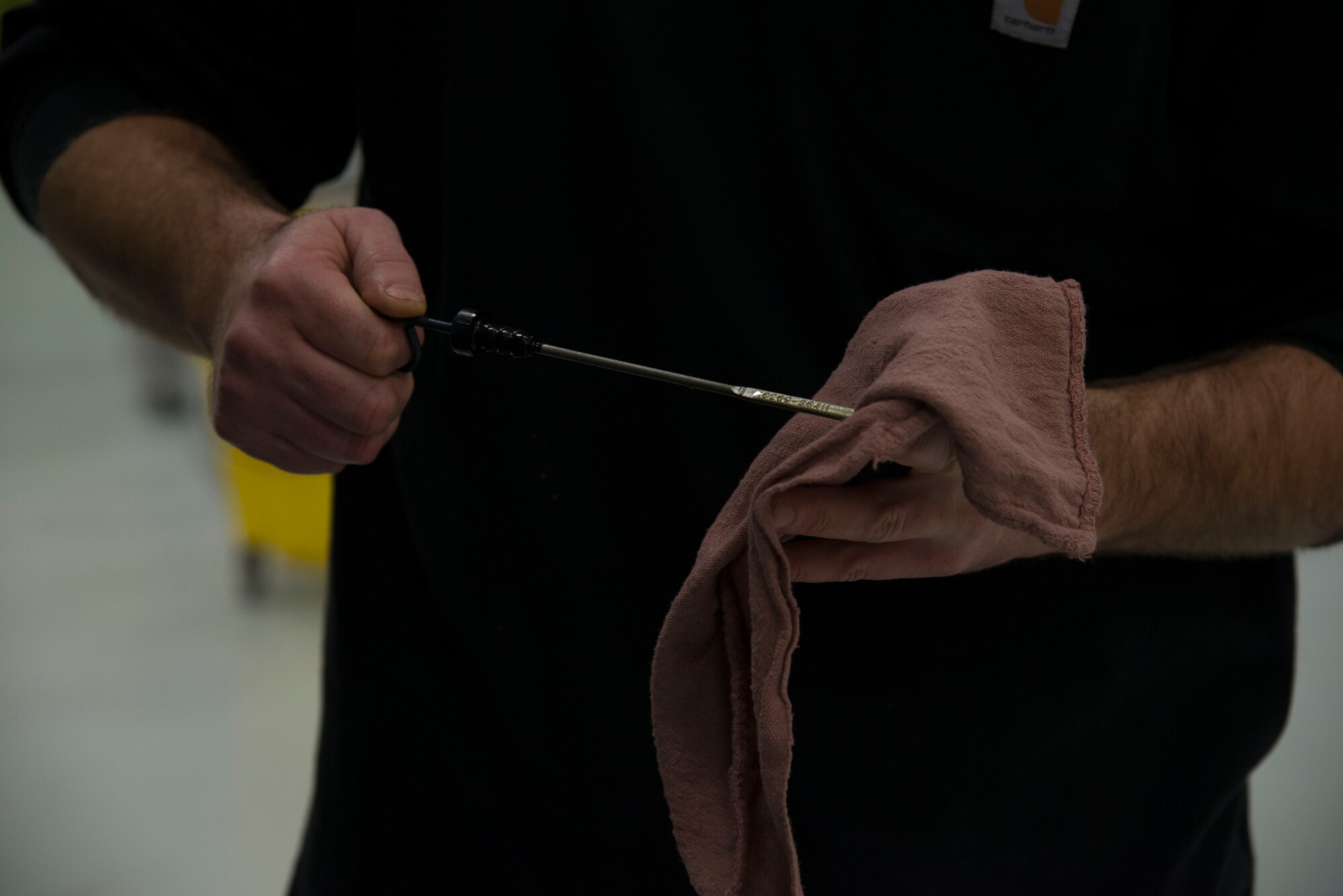 Mark Waugh, 375th Operations Support Squadron aerospace ground equipment mechanic, checks the oil on a light cart at Scott Air Force Base, Illinois, Dec. 12, 2018. Aerospace Ground Equipment is responsible for repairing, updating and inspecting the equipment necessary for maintaining aircraft while they’re on the ground.