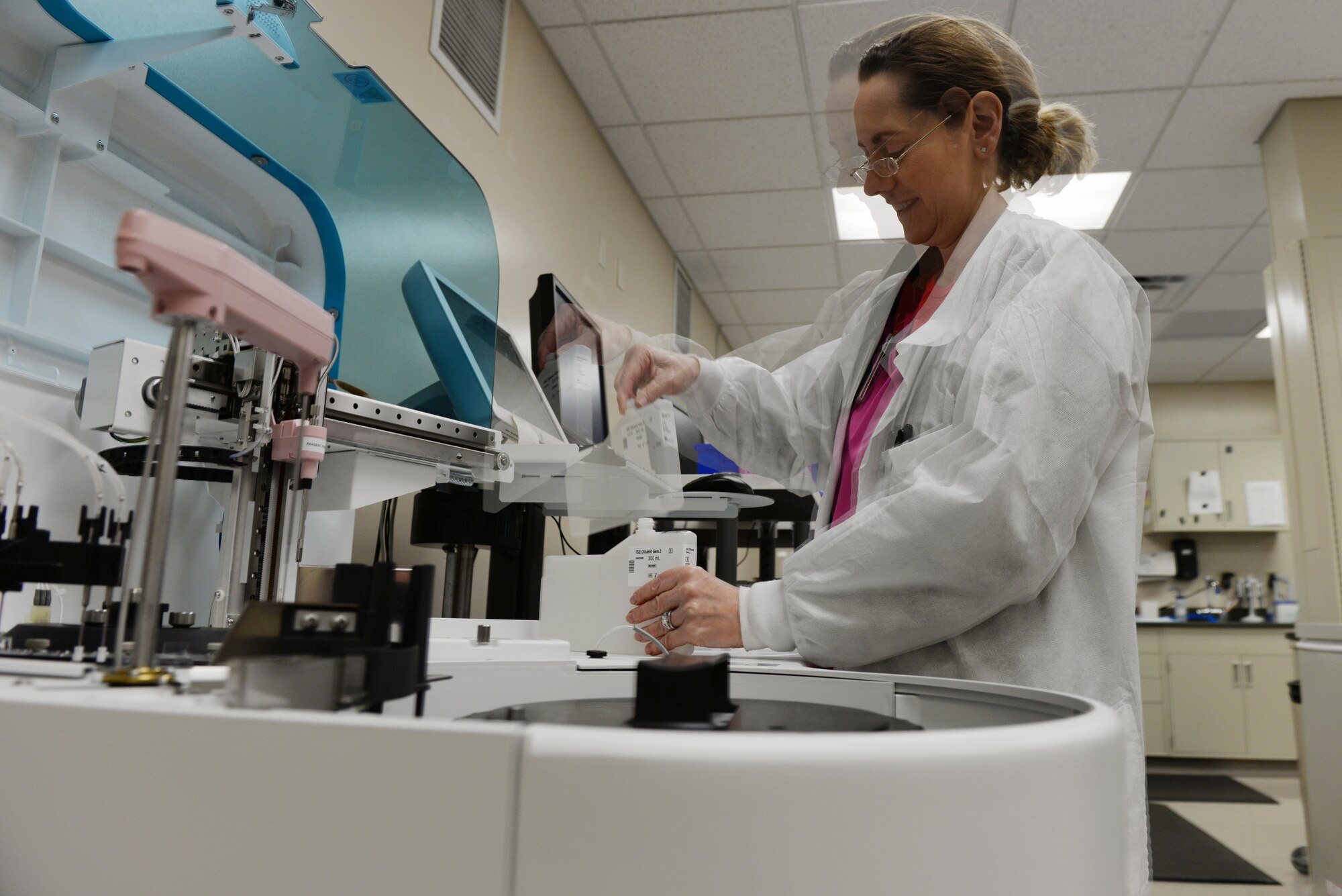 Patti James, a 28th Medical Support Squadron medical laboratory technologist, prepares a medical centrifuge for the day at Ellsworth Air Force Base, S.D., Dec. 4, 2018. The centrifuge is used to test amylin, iron, glucose and other hormones in the blood. (U.S. Air Force photo by Airman 1st Class Nicolas Z. Erwin)