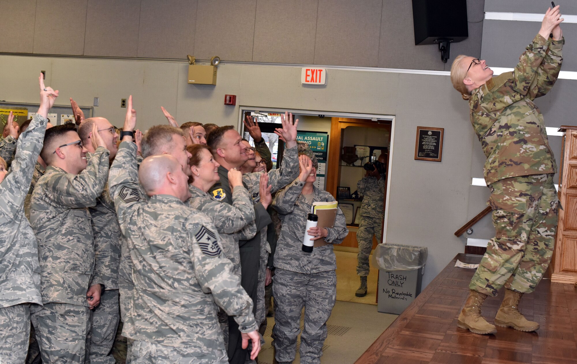 Members from the 166th Airlift Wing pose for a photo with the Delaware State Command Chief, Patricia Ann Ottinger at New Castle Air National Guard Base, Del., Jan 12, 2019. After closing remarks at the Senior Leader Conference, the Army and Air National Guard attended separate breakout sessions with their respective service to discuss topics specific to their branch of service.