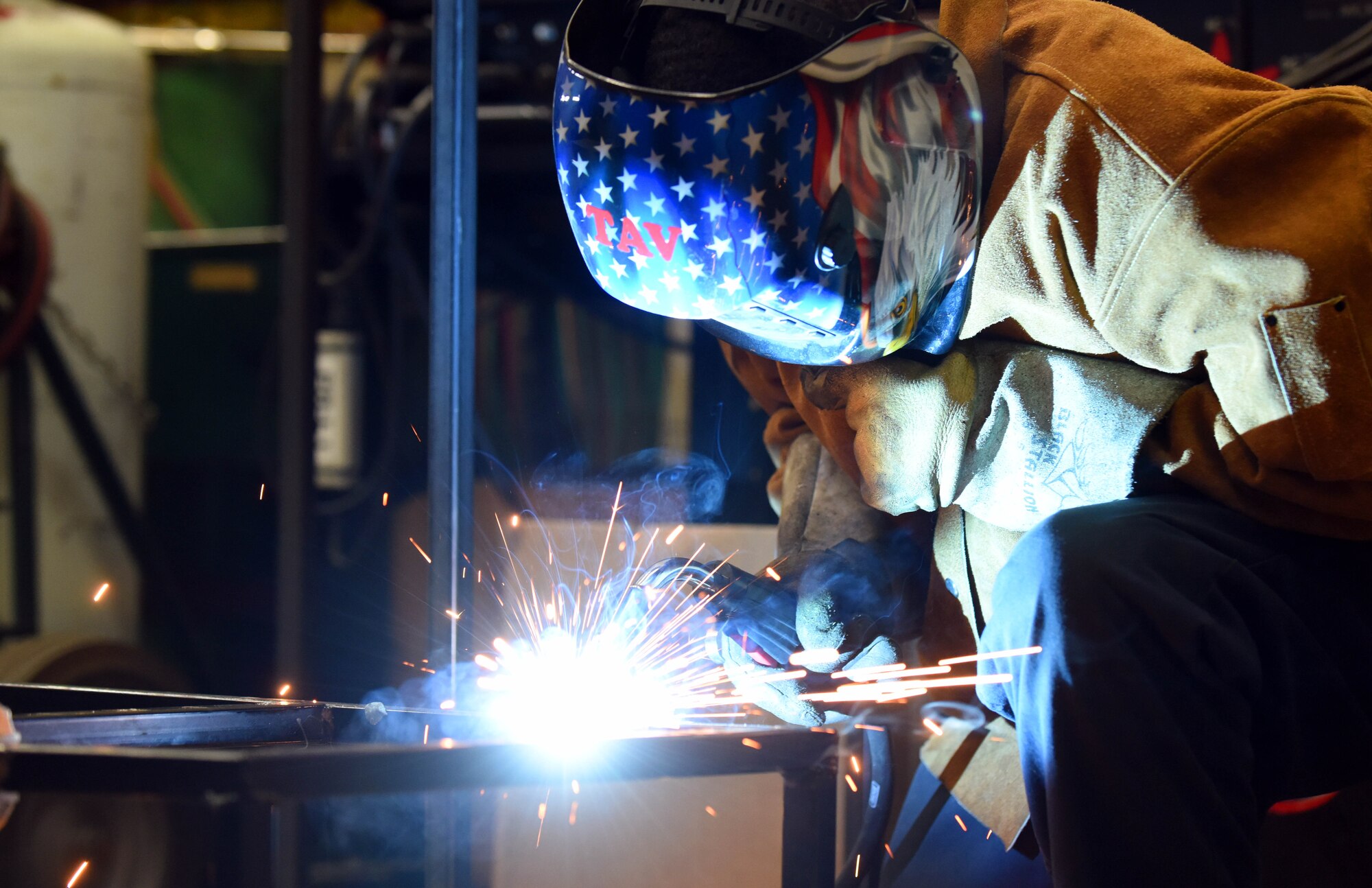 Senior Airman Victor Gathara, a 28th Logistics Readiness Squadron vehicle maintenance equipment technician, welds a bench frame to meet the new length requirements of the new bread trucks at Ellsworth Air Force Base, S.D. Dec. 6, 2018. The benches are pulled from the older models, broken down to their frames and then refitted to be put in the new vehicles. (U.S. Air Force photo by Senior Airman Donald C. Knechtel)