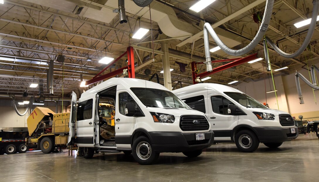 Two multi-purpose vans known as bread trucks await refurbishing in the 28th Logistics Readiness Squadron vehicle maintenance garage at Ellsworth Air Force Base, S.D., Dec. 6, 2018. The new modifications to the vans will both enhance mobility, due to the new tool cages and equipment racks, and provide warmth in the harsh winters thanks to the new insulation. (U.S. Air Force photo by Senior Airman Donald C. Knechtel)