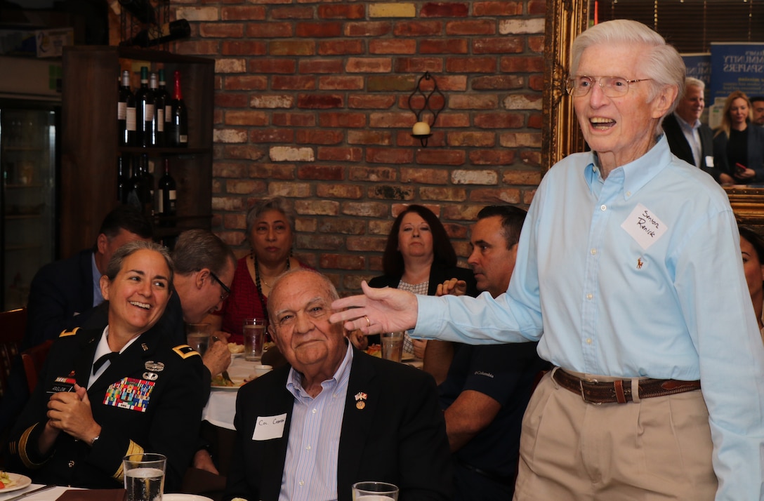 U.S. Army Maj. Gen. Patricia Anslow, Chief of Staff at U.S. Southern Command (SOUTHCOM), left, listens while Richard Renick, a former Florida state senator and Korean War era Navy veteran.