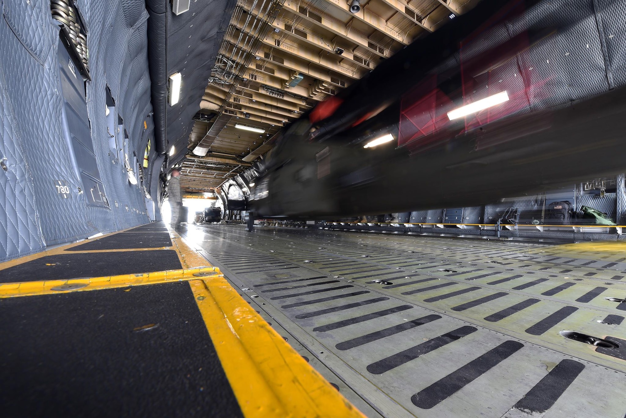 A U.S. Army UH-60 Black Hawk is loaded into a C-5M Super Galaxy aircraft as part of full-spectrum readiness training event Jan. 13, 2019, at Travis Air Force Base, California. The C-5M is not the normal transport for the Black Hawks, but was offered as transport to the Army in the interest of full-spectrum readiness training for Travis’ C-5M personnel. (U.S. Air Force photo by Airman 1st Class Christian Conrad)