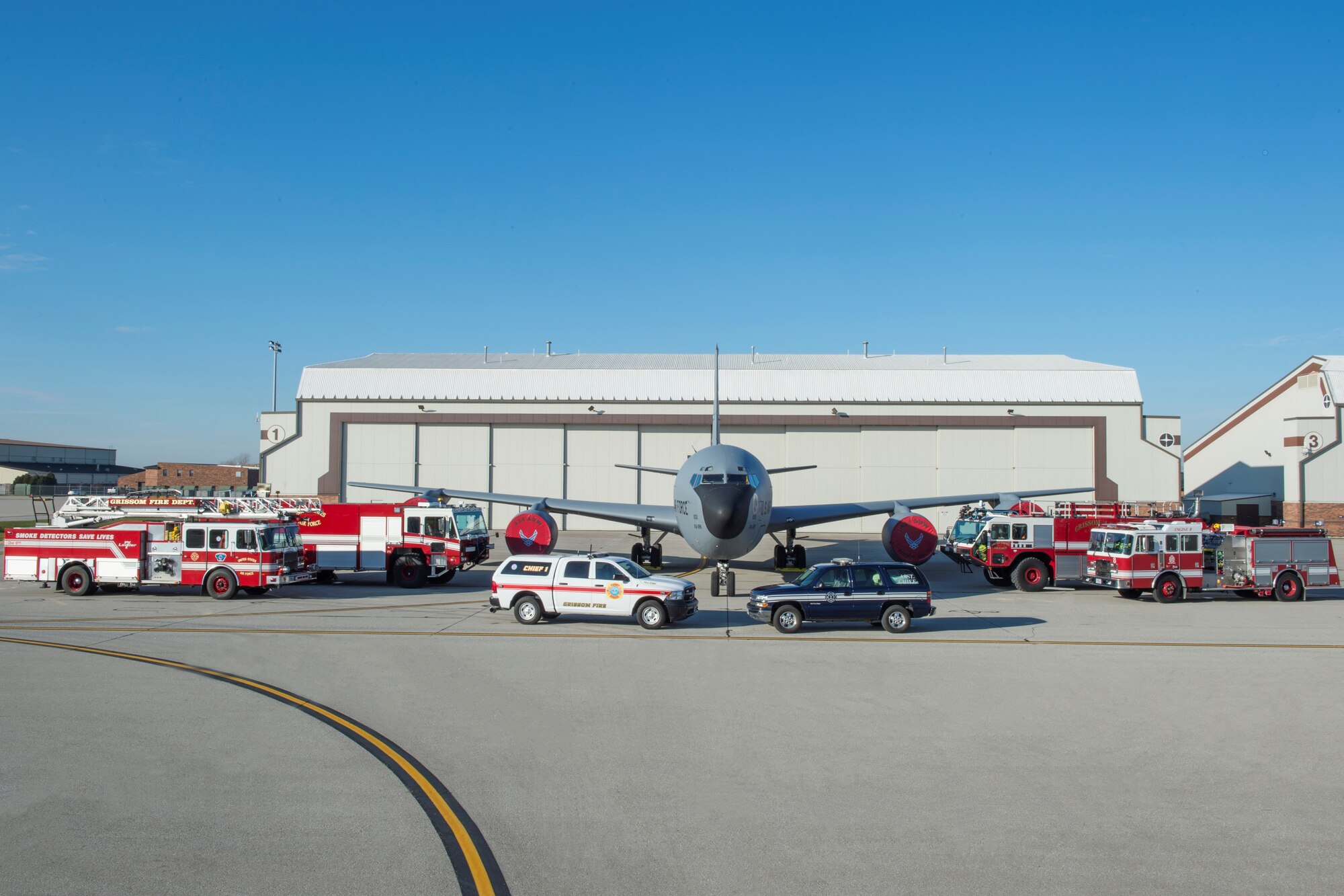 Grissom's fire department poses for a photo in front of a 434th Air Refueling Wing KC-135R Stratotanker at Grissom Air Reserve Basea, Ind., Dec. 02, 2017. In an ongoing display of regional display of regional camaraderie, GFD routinely supports the surrounding communities by responding to emergency runs and requests for help, known as mutual aid. (U.S. Photo/Master Sgt. Ben Mota)