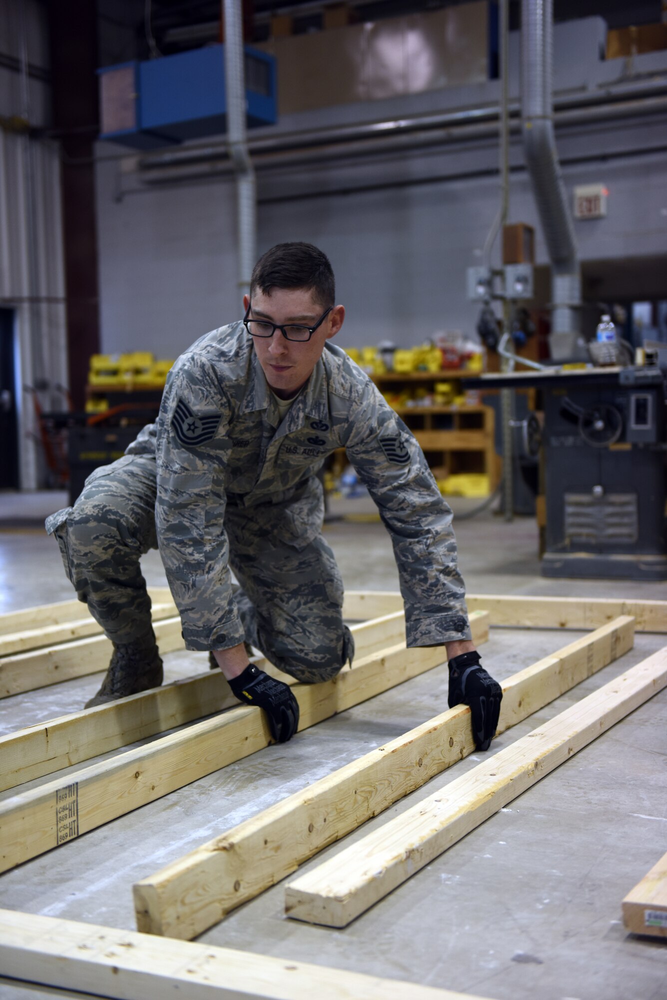 Tech. Sgt. Seth Maurer, a structures specialist with the 201st RED HORSE, Fort Indiantown Gap, Pennsylvania, puts together the frame of a wall to complete training requirements Oct. 28, 2018. Maurer has been with the 201st RHS since 2014 when he separated from active-duty and moved to Pennsylvania with his family. (U.S. Air National Guard photo by Senior Airman Julia Sorber/Released)