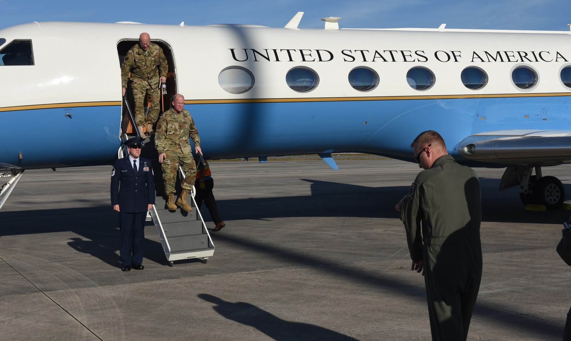 U.S. Air Force officials disembark aircraft