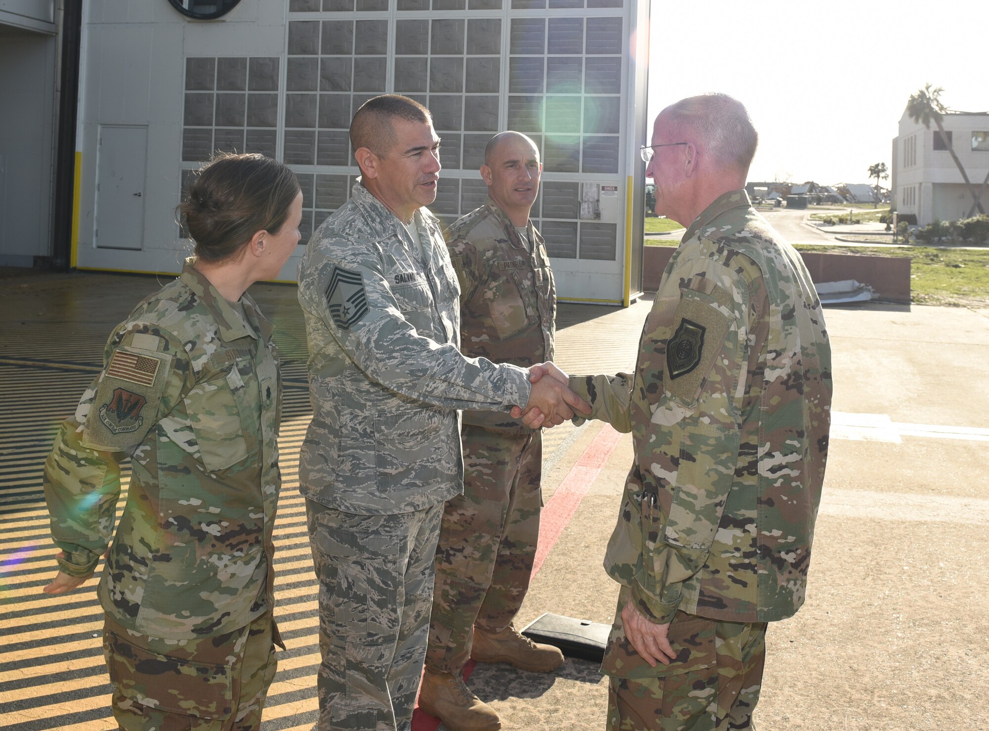 U.S. Air Force officials greet each other