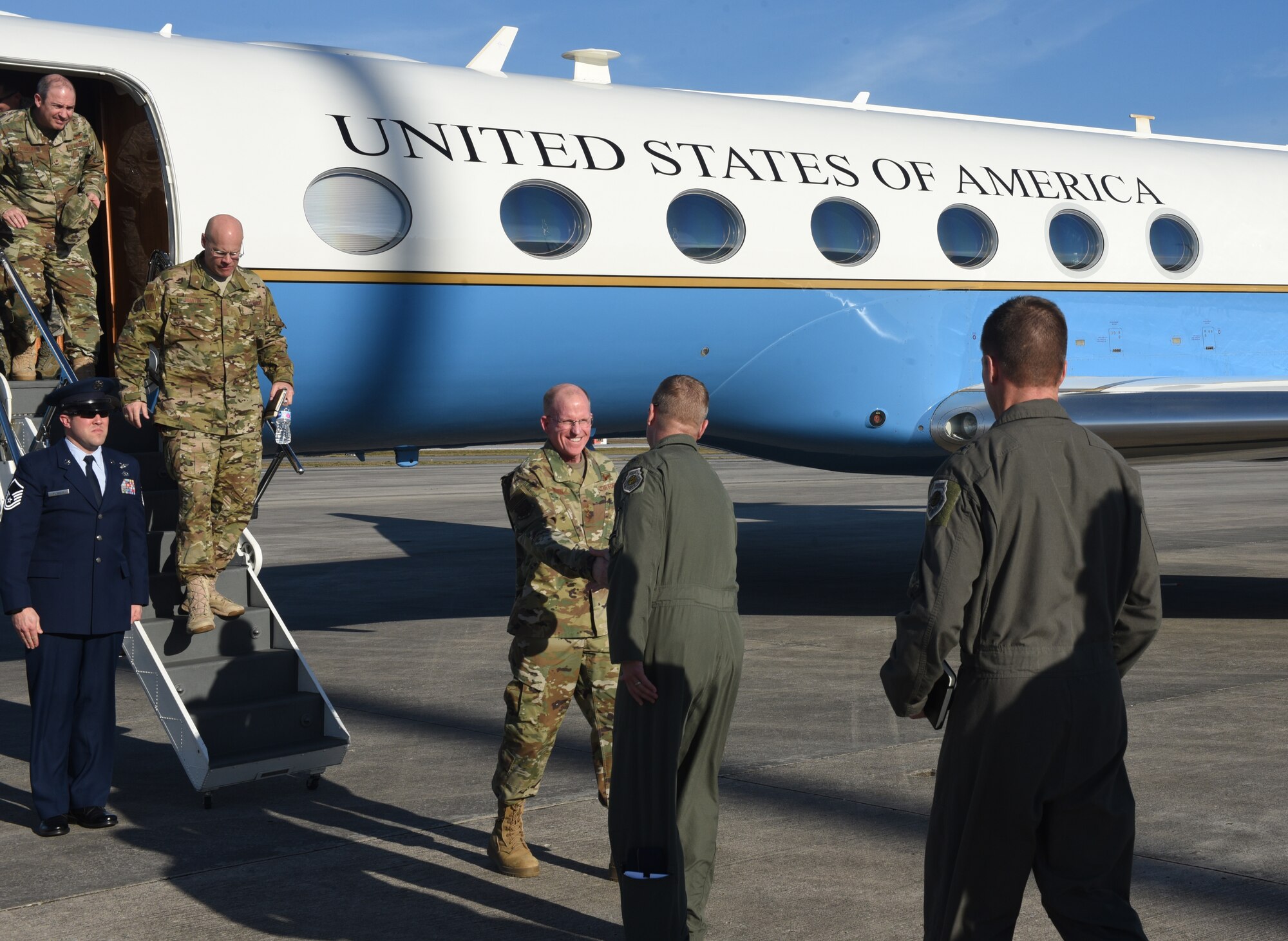 U.S. Air Force officials shake hands